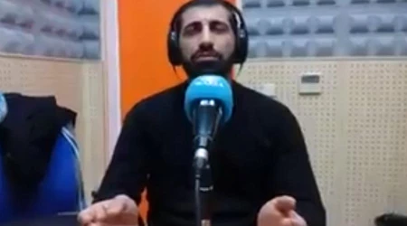 Sacerdote canta Padre Nuestro en arameo para ayudar a su ciudad destruida por ISIS