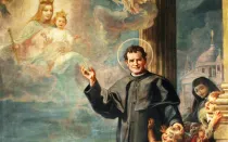 Don Bosco colocando a todos bajo la protección de María Auxiliadora