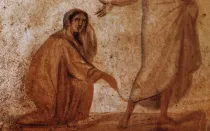 Arte paleocristiano en las catacumbas de Roma que representa la curación de la hemorroísa.