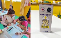 Voluntaria de Voices of Help apoya a una niña con sus tareas escolares / fotografía del envoltorio de una “Papaleta”.