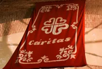 Banderola con logo de Cáritas. Foto: Nic McPhee (CC BY-SA 2.0)