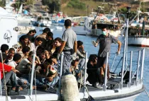 Inmigrantes llegando a la isla de Lampedusa. Foto: Sara Prestianni (CC BY 2.0)