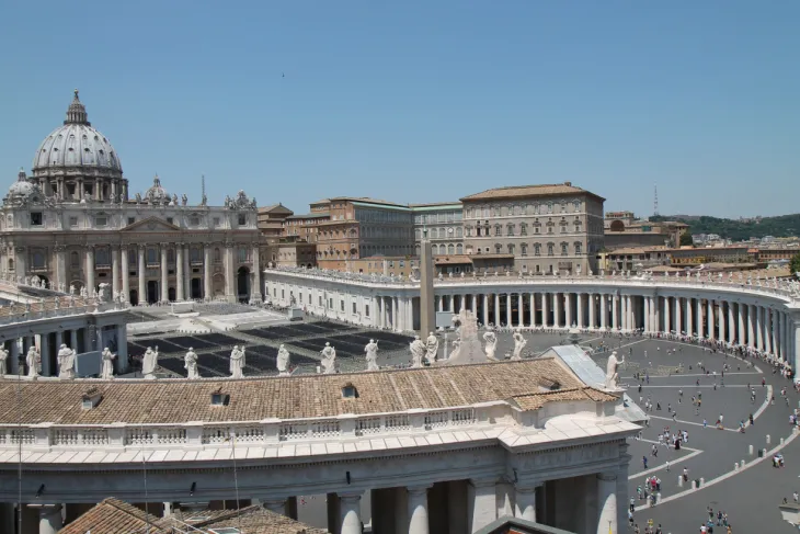 Vatican City - June 18, 2015. A view of St. Peter`s Basilica and St. Peter's Square in Vatican City, taken from a nearby roof, on June 18, 2015.