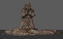 Cristo llora por una víctima de asesinato en la estatua "No matarás" de Timothy Schmalz.